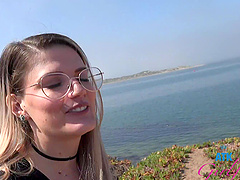 Beautiful woman with long hair seduces her partner and gives him a blowjob.