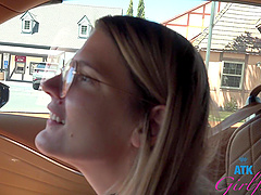 Beautiful woman with glasses Riley Rose has natural big boobs and wears a tattoo.