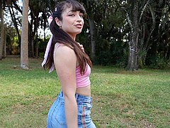 Beautiful long-haired brunette shows off her natural tits in a solo set.