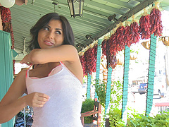 Ariane’s long hair falls on her shoulders as she pleases herself.