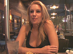 Anne is a blonde beauty who reveals her big boobs in public.