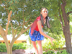 Real-life beauty with natural tits, wearing a costume, masturbates.