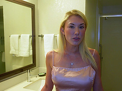 Beautiful blonde gets fucked in cowgirl position on the bed.