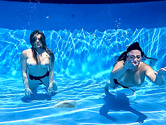 Long-haired brunette Cory Chase in hot pool scene