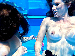 Long-haired brunette Cory Chase in hot pool scene