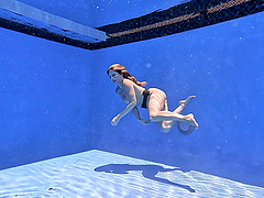 Beautiful brunette milf Cory Chase solo set in the pool.