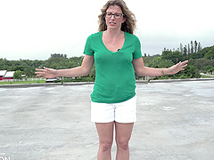 Beautiful blonde milf in glasses wearing shorts, Cory Chase’s solo performance.