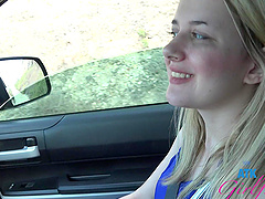 Beautiful blonde gets her puffy pussy probed in a car fetish video