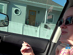 Beautiful woman with glasses has rough sex in a car