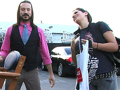 Beautiful women with amazing assets pose in the middle of the set.