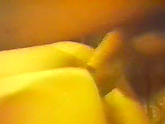 Cute girl in mesh and leather corset, caressing herself with fingers