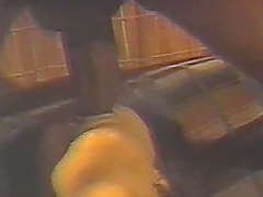 Cute girl in mesh and leather corset, caressing herself with fingers