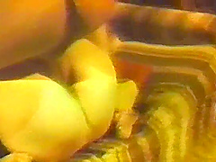 Cute girl in mesh and leather corset, caressing herself with fingers