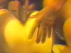 Cute girl in mesh and leather corset, caressing herself with fingers