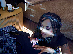 Long-haired brunette gets her shaved pussy fucked in missionary position.