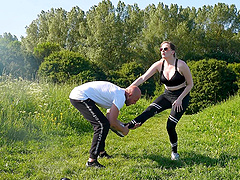 Cute girl in mesh and leather corset