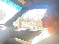 A couple making love in a car in the forest