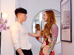 A busty redhead milf, Sophia Locke, enjoys passionate bareback sex.