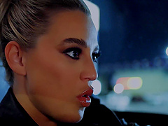 Two sexy people having fun in the car, a scene sizzling with passion.