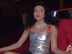 A couple enjoys a private dance with stunning stripper Mini Mitzix in the club