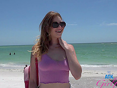 A couple has a romantic sex in the car on a sunny beach day with Lucy Foxx.