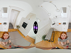 A beautiful freckled redhead girl in reverse cowgirl position