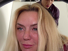 Alla Peek in sexy lingerie and stockings, giving a blowjob