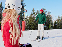 Brandi Love, the busty milf, fucks with her husband in a steamy scene.