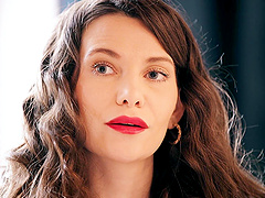 Subil Arch in seductive lingerie and pantyhose, showcasing her charm.