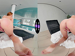 A cute and sweet red-haired girl named Holly Molly plays with her pussy.