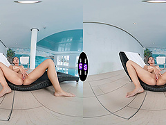 Stunning brunette Vixi Rafi enjoys solo play by the pool.