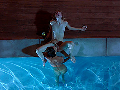 Two petite lesbians Janice Griffith and Ivy Wolfe have fun by the pool.