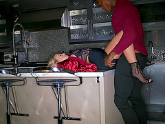 Jason Luv and Bailey Brooke make passionate love in the kitchen, showcasing their chemistry.