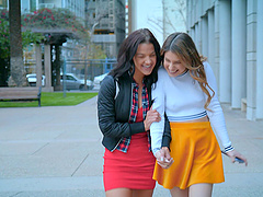 Two sexy babes share a big black cock in an intense threesome scene