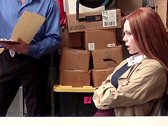 Redheaded vixen Ella Hughes seduces Tommy Gunn in a steamy office rendezvous