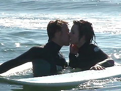 Brunette Nikki Hearts enjoys a steamy beach romp with her hunk in wild positions