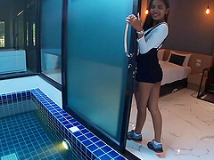 Thai babe seductively strips off her bra by the pool in POV heat