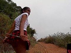 Thai babe in a mini skirt teases with a stealthy POV handie outside