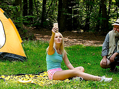 Young Lovita pleases her silver fox in the great outdoors