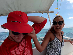Asian amateurs on a Thai yacht, naturals out in the sun