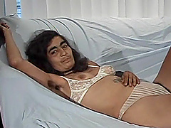 Mature woman with a mustache is masturbating