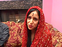 Hot brunette with a piercing enjoys being fucked in an interracial mmf threesome