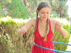 Lovely Aurielee Gets Dirty While Swinging The Hoop