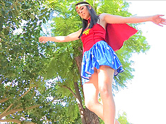 Cute brunette flashes the camera while wearing a Wonder Woman costume