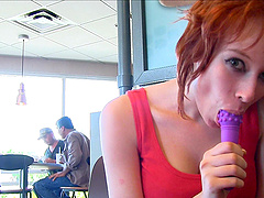 Erotic outdoor solo model shoot with a radiant redhead