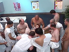 Mature redhead Bailey O'Dare enjoys a gangbang and gets facialed