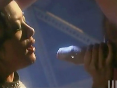 Sassy flexible  Asian babe moans while being fucked doggystyle in an interracial sex