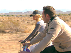 Beautiful blonde fucked in doggystyle by the campfire