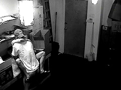A hidden security cam catches a couple fucking at work