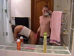 Russian couple Tanya and Andrew have fun in a bathroom